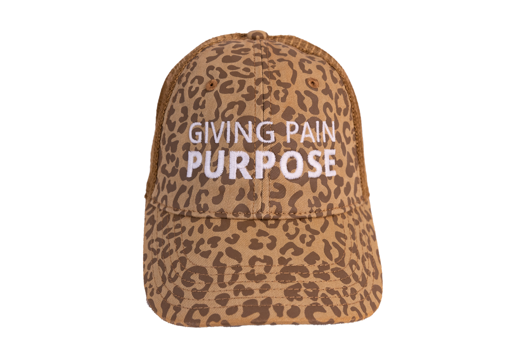 Leopard print cap with 'Giving Pain Purpose' text on a white background