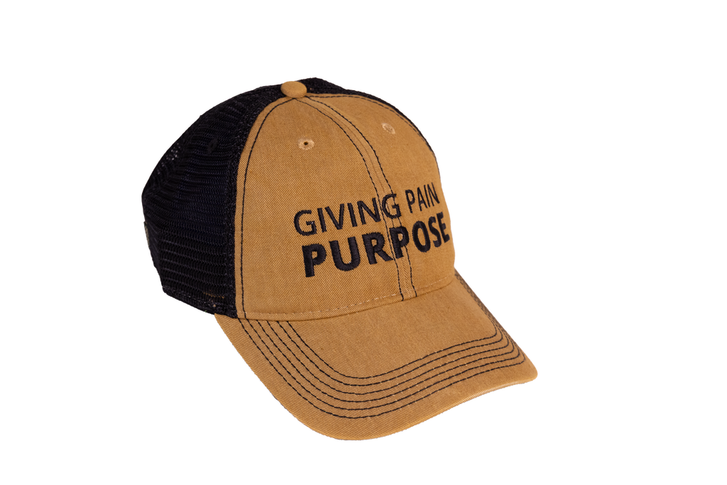 Brown and black cap with 'Giving Pain Purpose' text on a white background