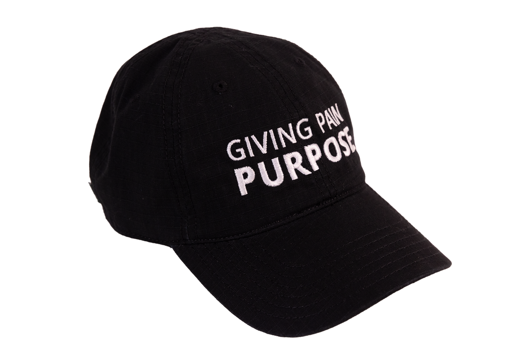 Black cap with 'Giving Pain Purpose' text on a white background